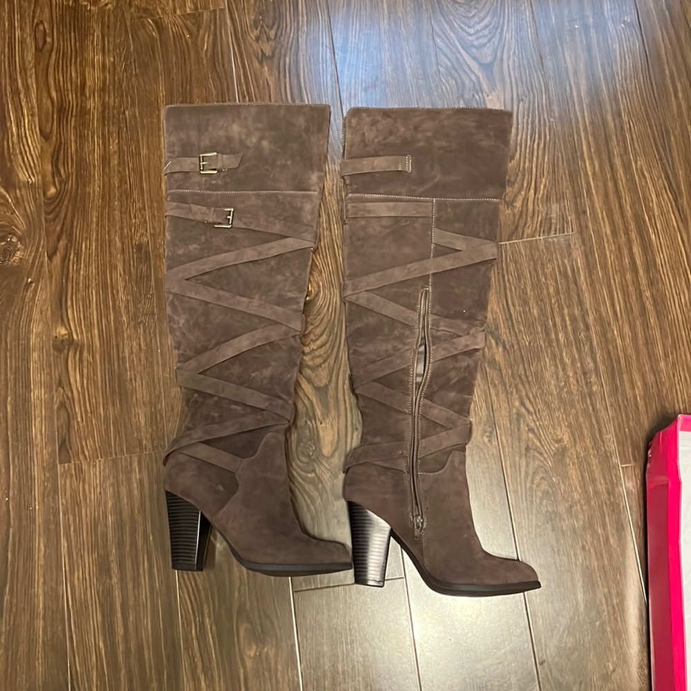 Thigh high heeled boots